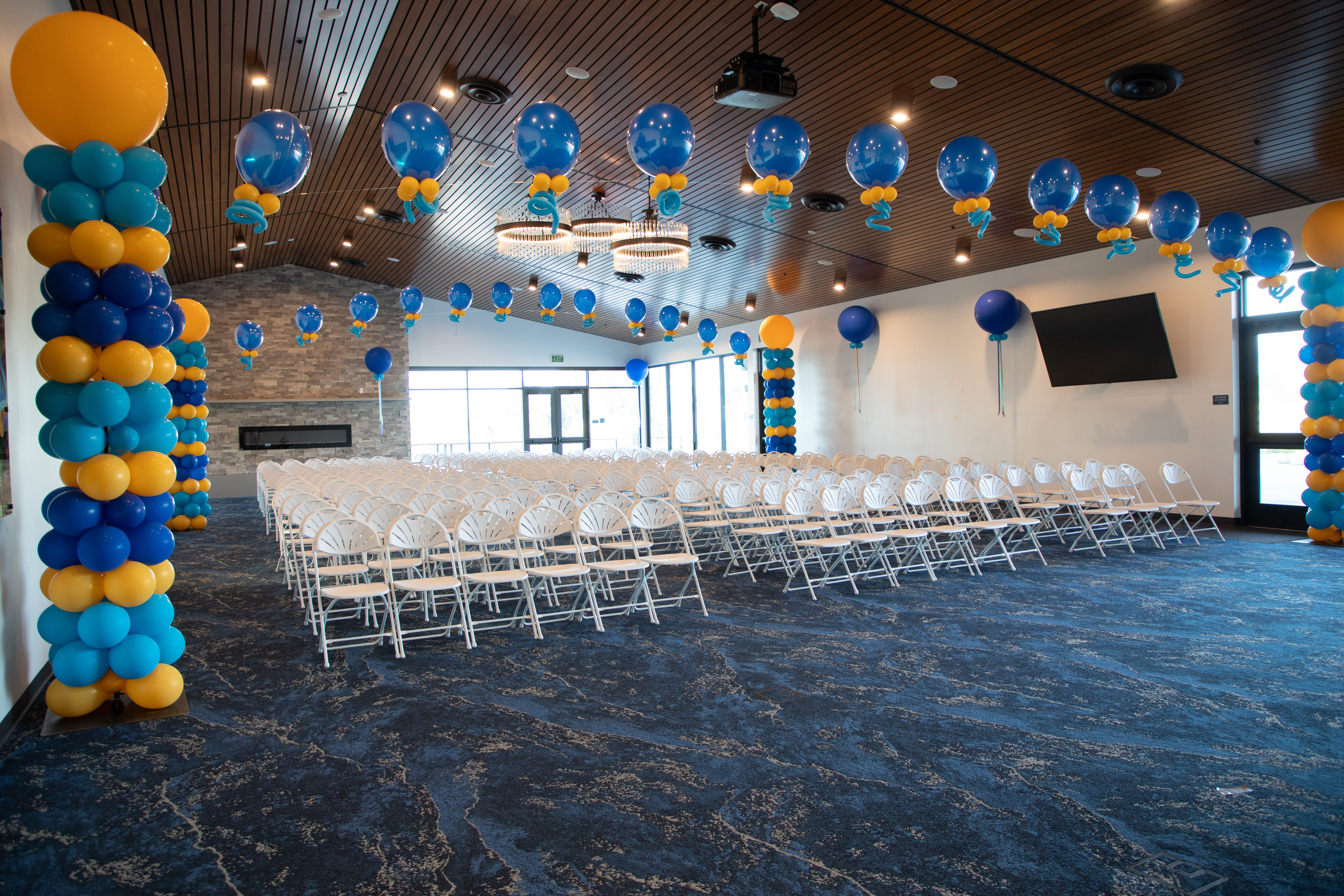 Banquet hall with chairs set up in a row